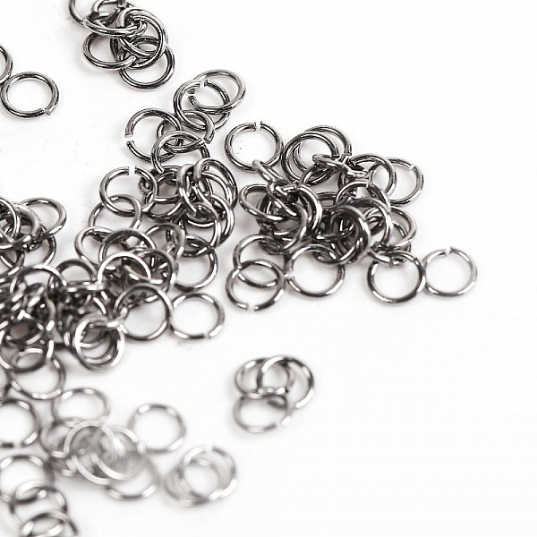 10 &Aring;pne skj&oslash;teringer 04 mm Rustfritt st&aring;l nr. 01-02