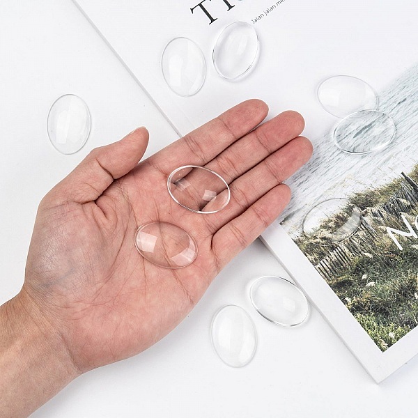 10 ovale cabochoner 25 x 35 mm i klart burrglass N&deg;20