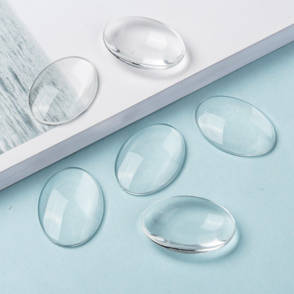 10 ovale cabochoner 25 x 35 mm i klart burrglass N°20