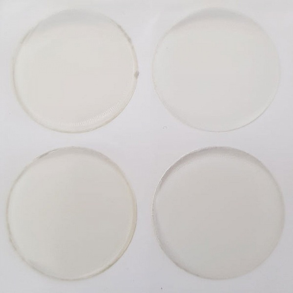 4 selvklebende 25 mm gjennomsiktige harpiks cabochoner