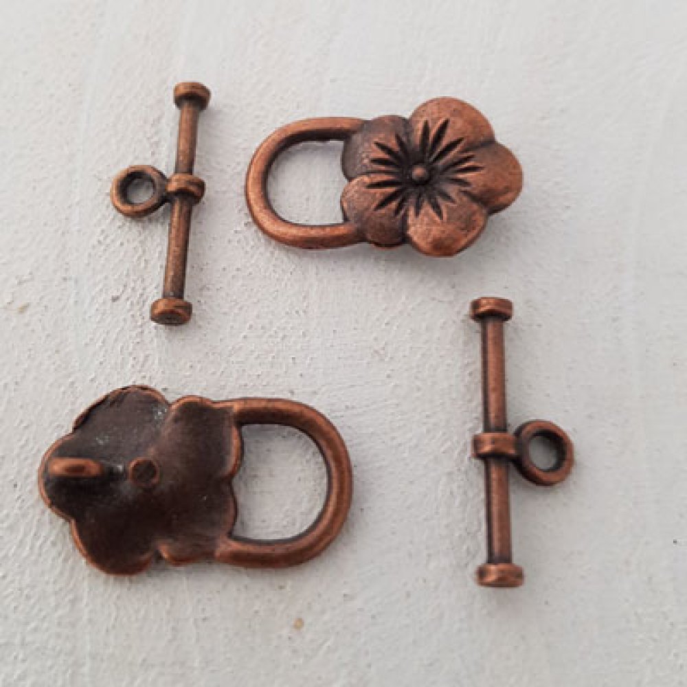 5 vippelåser med blomstermotiv Bronse nr. 17