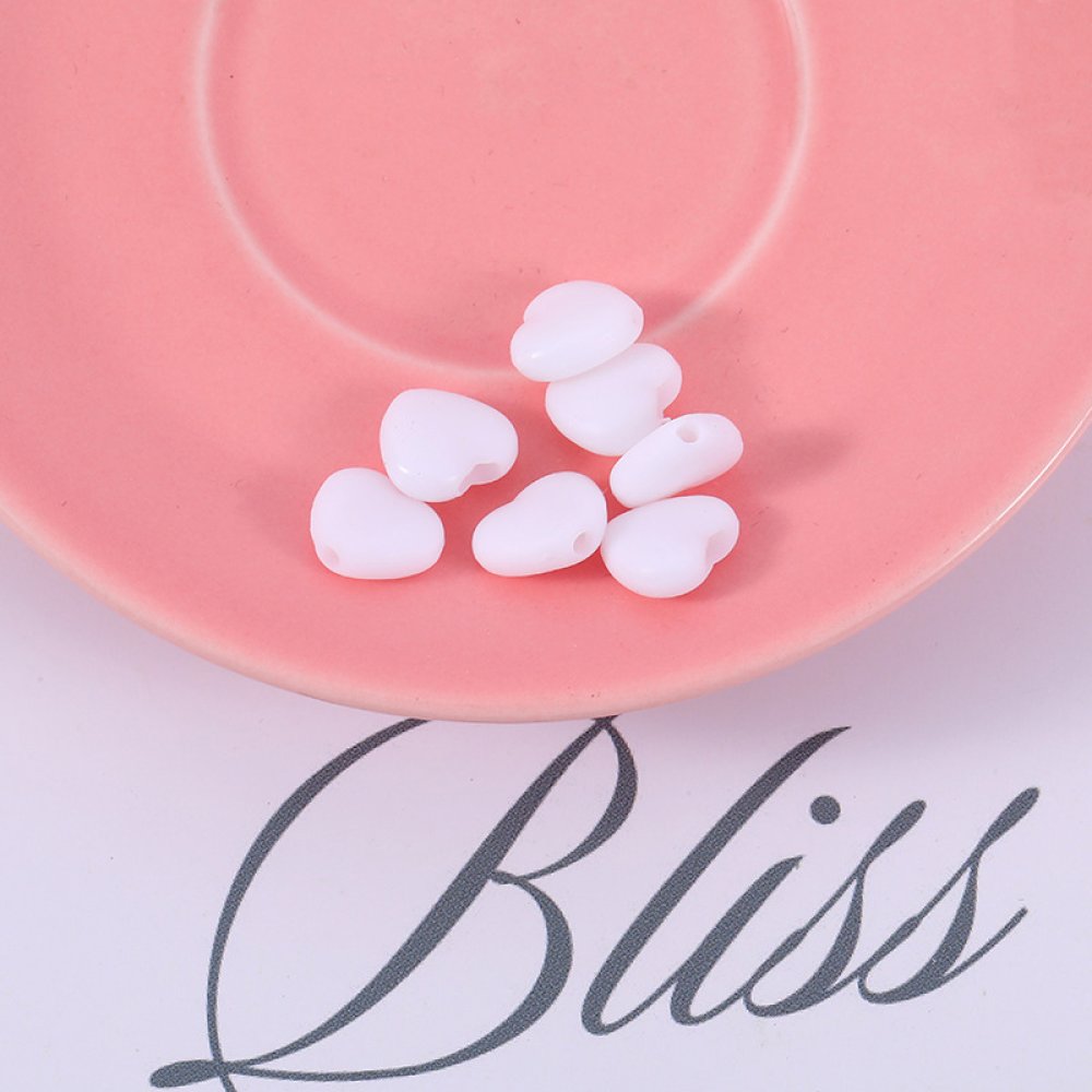 Elastisk slips med hvit gummi-hjertespenne N°04 x 10 stk.