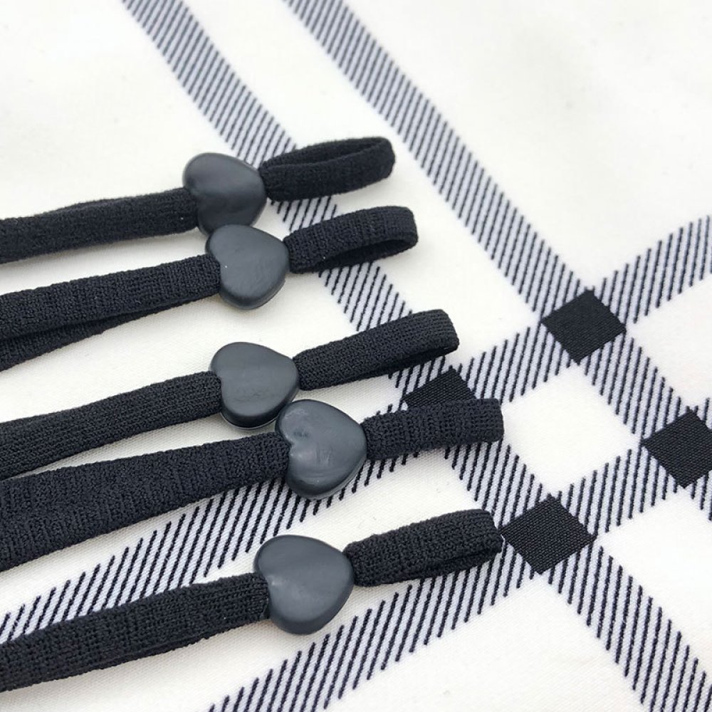 Elastisk slips med svart gummi-hjertespenne N°04 x 10 stk.