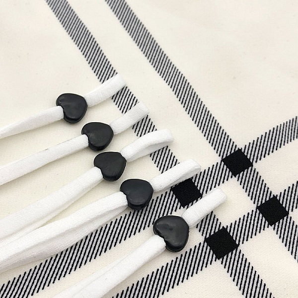 Elastisk slips med svart gummi-hjertespenne N&deg;04 x 10 stk.