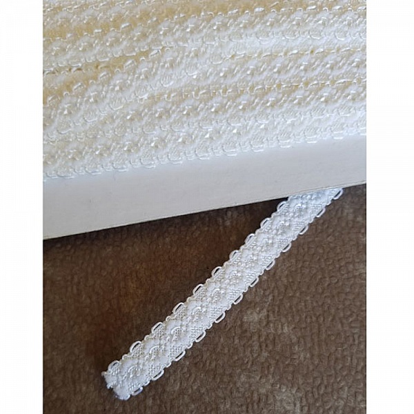 Av meteren Fancy hvit elastisk 11 mm.