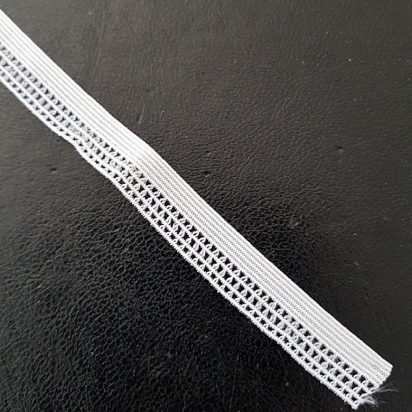 Av meteren Fancy hvit elastisk 12 mm.