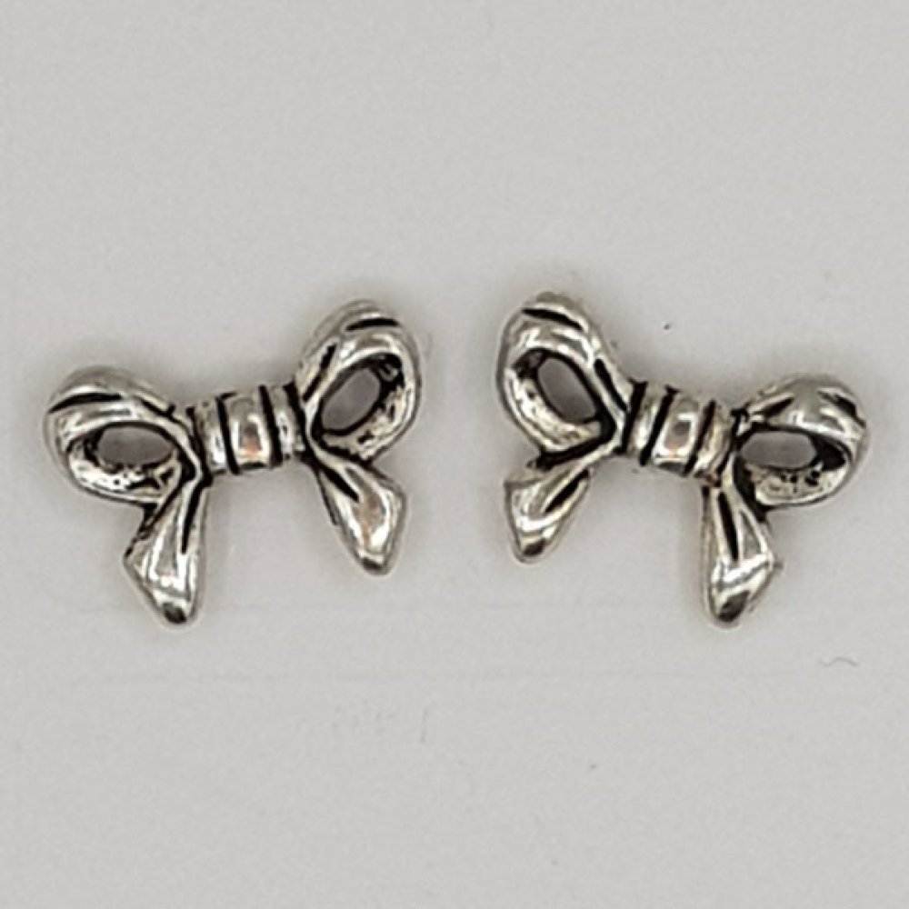 Charm Node N°11 sølv metallbånd knute charm