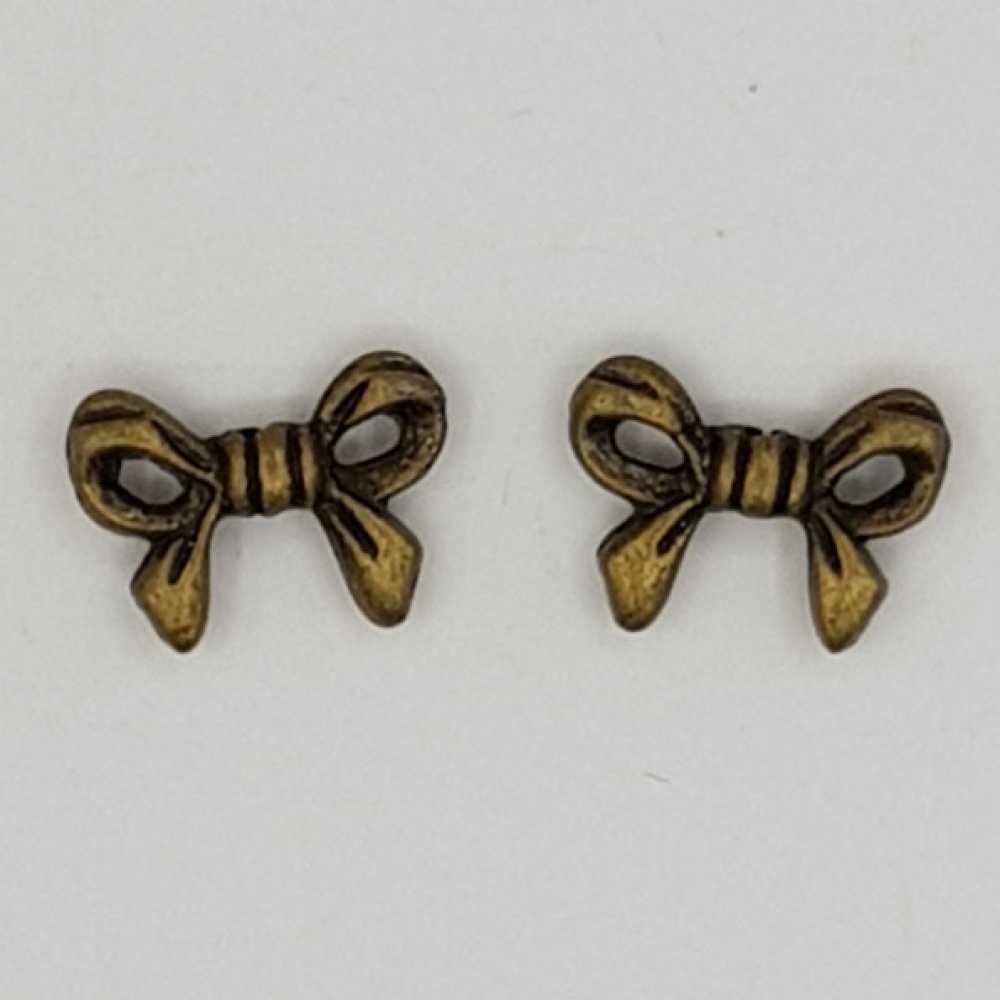 Charm Node N°11 metallbånd knute charm bronse