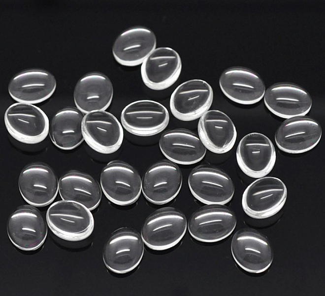 Cabochon Oval 08 x 10 mm i klart burrglass N&deg;15 per 2 stk.