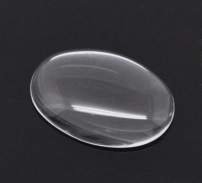Oval cabochon 18 x 25 mm i klart burstglass N&deg;19