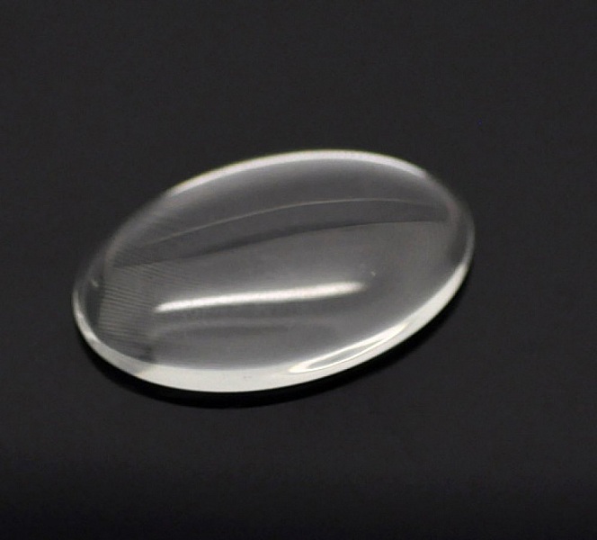 Oval cabochon 25 x 35 mm i klart burrglass N&deg;20