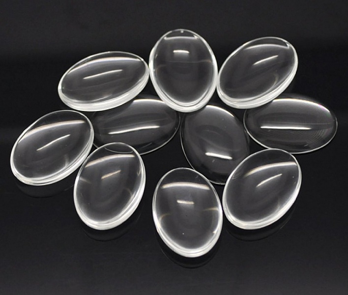 Oval cabochon 25 x 35 mm i klart burrglass N&deg;20