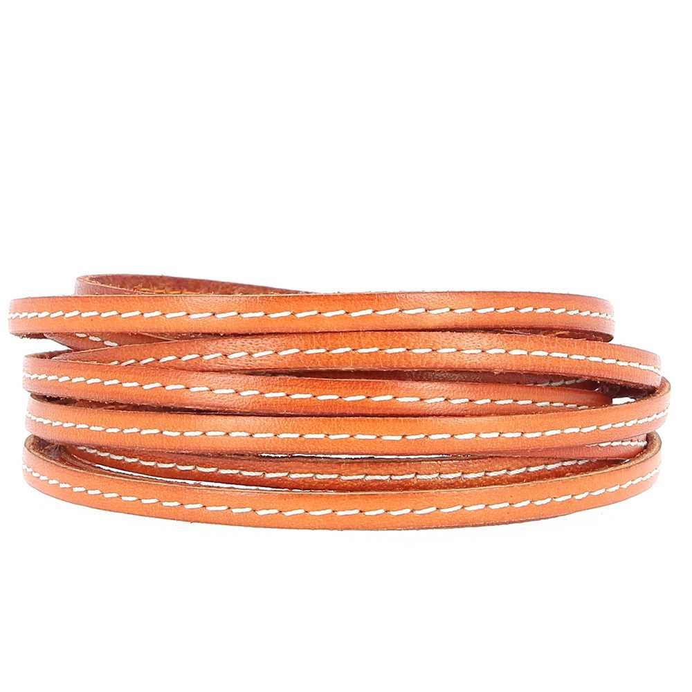 Flatt kalveskinn Orange 05 mm x 20 cm Sydd 1 hvit tråd
