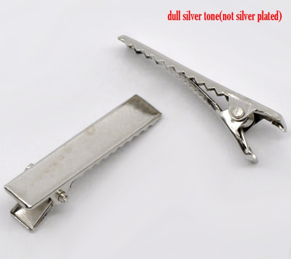 Sett med 20 krokodilleklemmer - Sølvfarge 32 mm x 7 mm.