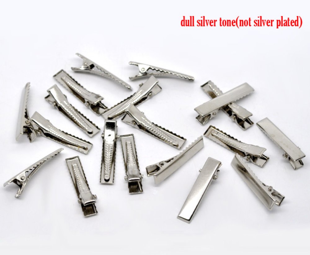 Pakke med 50 krokodilleklemmer - Sølvfarge 32 mm x 7 mm.