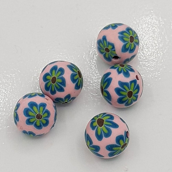 Perle p&acirc;te polym&egrave;re fond Rose et fleurs 12 mm