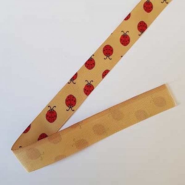 Ruban gros grain coccinelle rouge fond beige N&deg;02 de 22 mm au m&egrave;tre