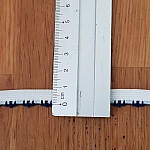 Av meteren Fancy hvit elastisk 9 mm.