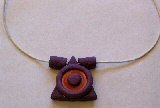 Pendentif c&eacute;ramique