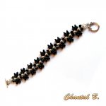 kveldsarmbånd hvite swarovski perler svarte glassperler