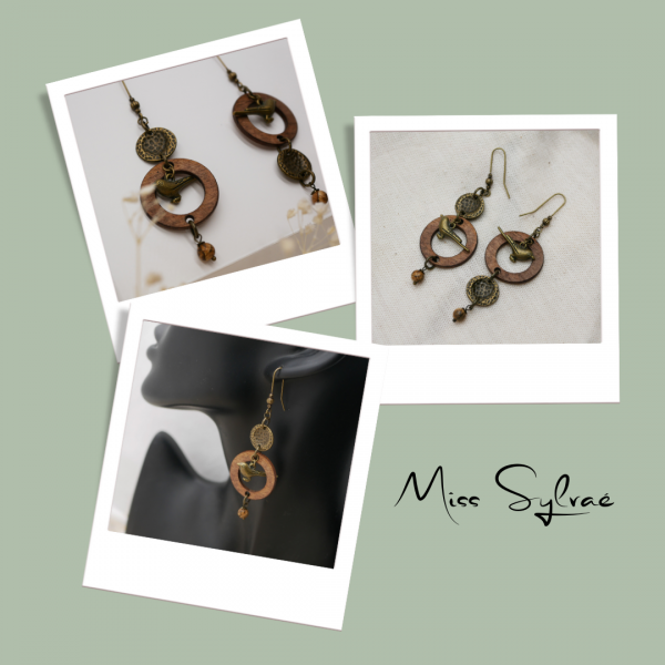 &Oslash;redobber i tre med messingfugler