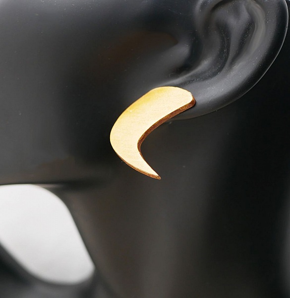 Grafiske &oslash;redobber i gullbelagt tre