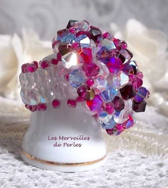 Rosa stikkende ring med Swarovski krystallfasetter og spinnere