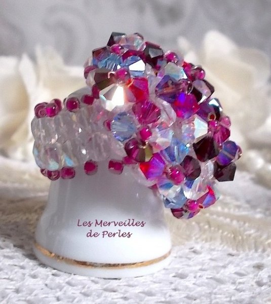Rosa stikkende ring med Swarovski krystallfasetter og spinnere