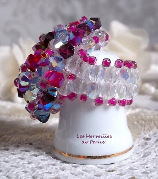 Rosa stikkende ring med Swarovski krystallfasetter og spinnere