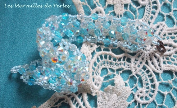 Crystal Blue armbånd med Swarovski krystallfasetter og spinnere