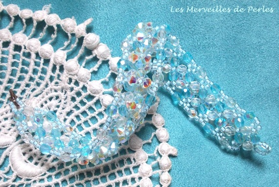 Crystal Blue armbånd med Swarovski krystallfasetter og spinnere