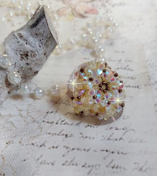 Aurora-ring med fasetter og snurretopper i Swarovski-krystall