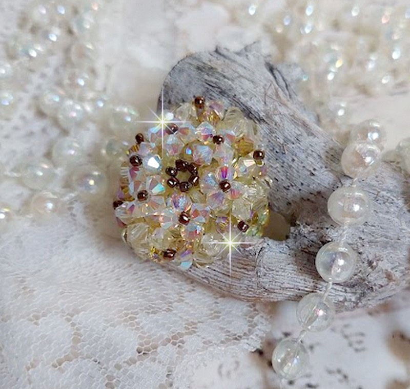 Aurora-ring med fasetter og snurretopper i Swarovski-krystall
