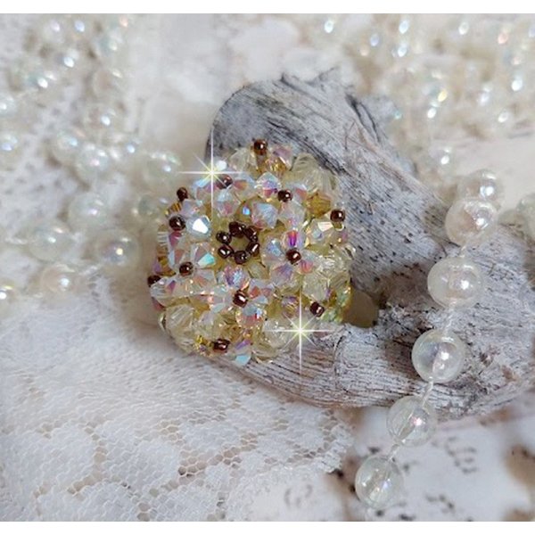 Aurora-ring med fasetter og snurretopper i Swarovski-krystall