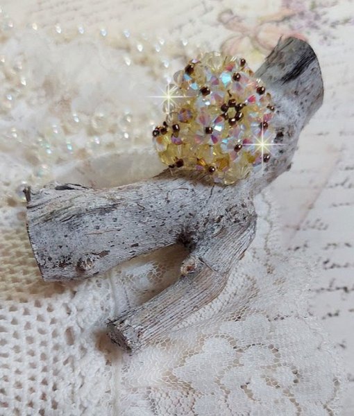 Aurora-ring med fasetter og snurretopper i Swarovski-krystall