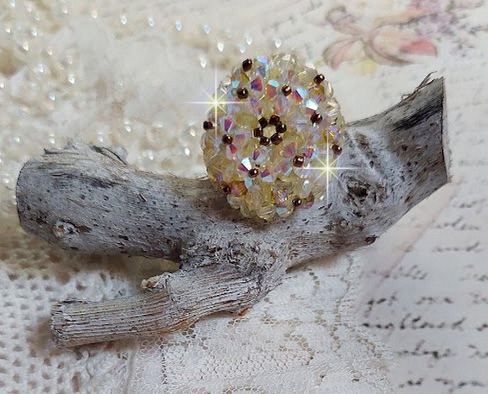 Aurora-ring med fasetter og snurretopper i Swarovski-krystall