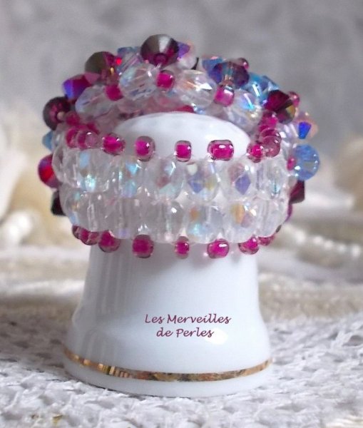 Rosa stikkende ring med Swarovski krystallfasetter og spinnere