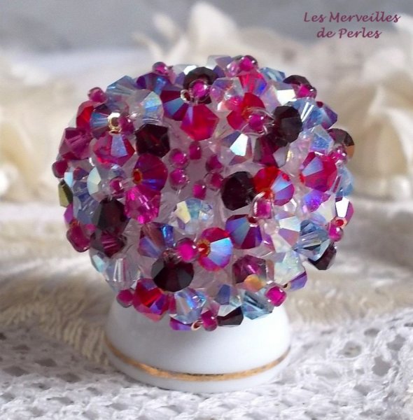 Rosa stikkende ring med Swarovski krystallfasetter og spinnere