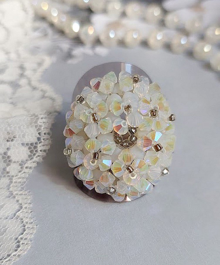 Krystallring med Swarovski krystallfasetter og spinnere