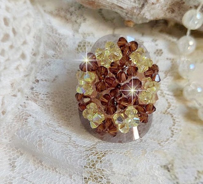 Stjernering med Swarovski krystallfasetter og spinnere