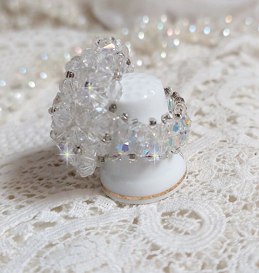 Flock ring med fasetter og snurretopper i Swarovski krystall