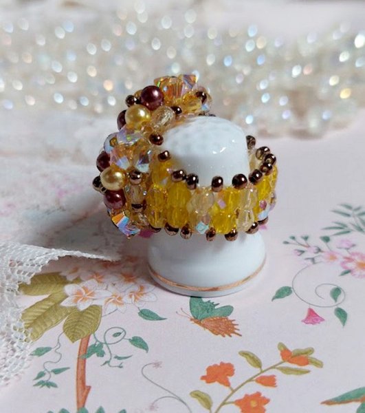 Solskinnsring med fasetter, perleperler og Swarovski-krystallspinnere