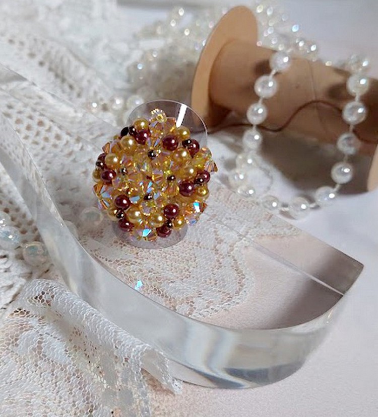 Solskinnsring med fasetter, perleperler og Swarovski-krystallspinnere