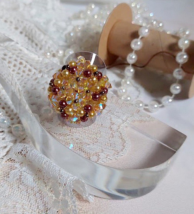 Solskinnsring med fasetter, perleperler og Swarovski-krystallspinnere