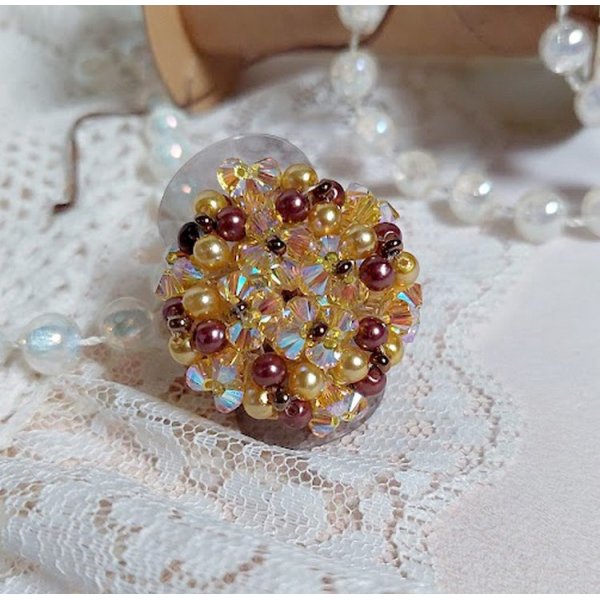 Solskinnsring med fasetter, perleperler og Swarovski-krystallspinnere