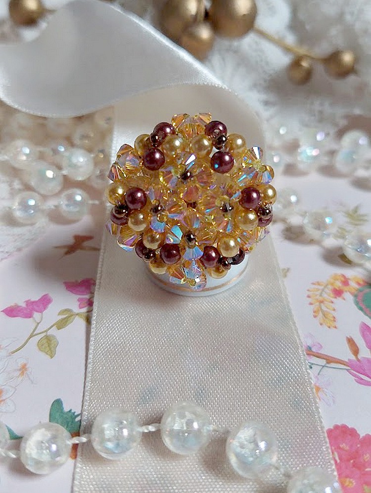 Solskinnsring med fasetter, perleperler og Swarovski-krystallspinnere