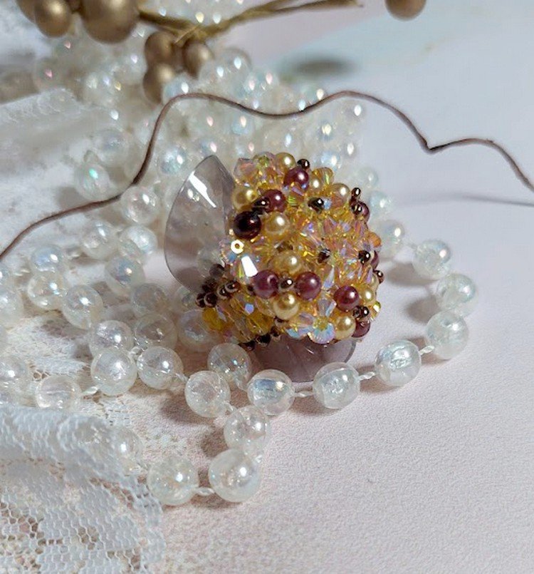Solskinnsring med fasetter, perleperler og Swarovski-krystallspinnere