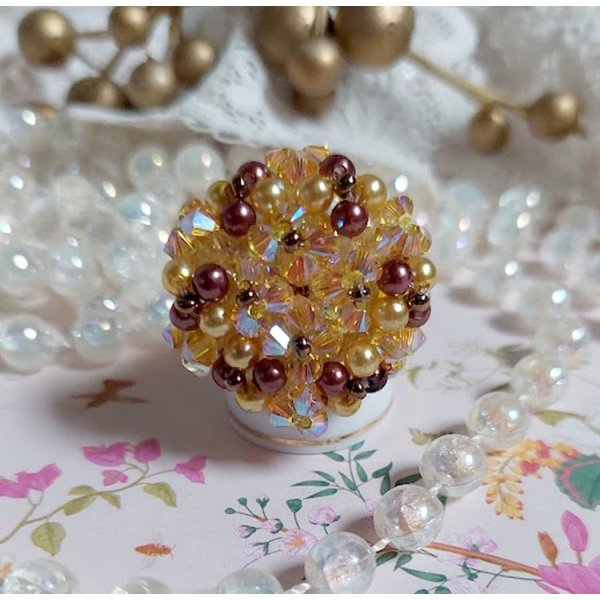 Solskinnsring med fasetter, perleperler og Swarovski-krystallspinnere