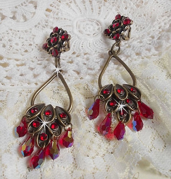 BO Irresistible Ruby Collection montert p&aring; lysestaker med Swarovskikrystaller.