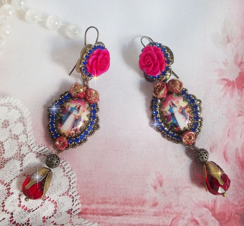 BO Maria og Jesus laget med harpiks cabochons, røde fasetterte pærer og diverse tilbehør